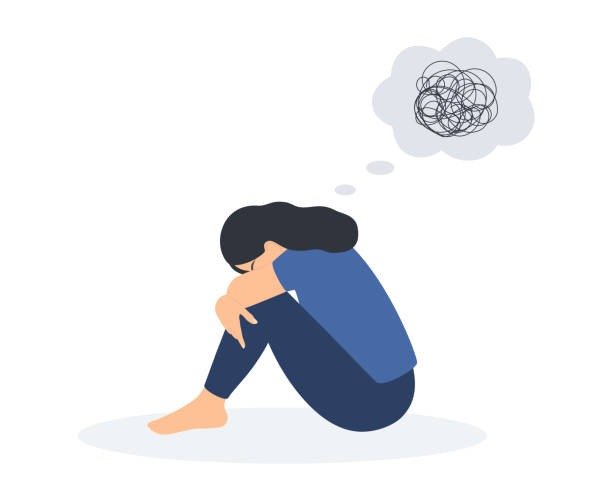 Ilustração de uma pessoa sentada e encolhida, representando sintomas de depressão em adultos